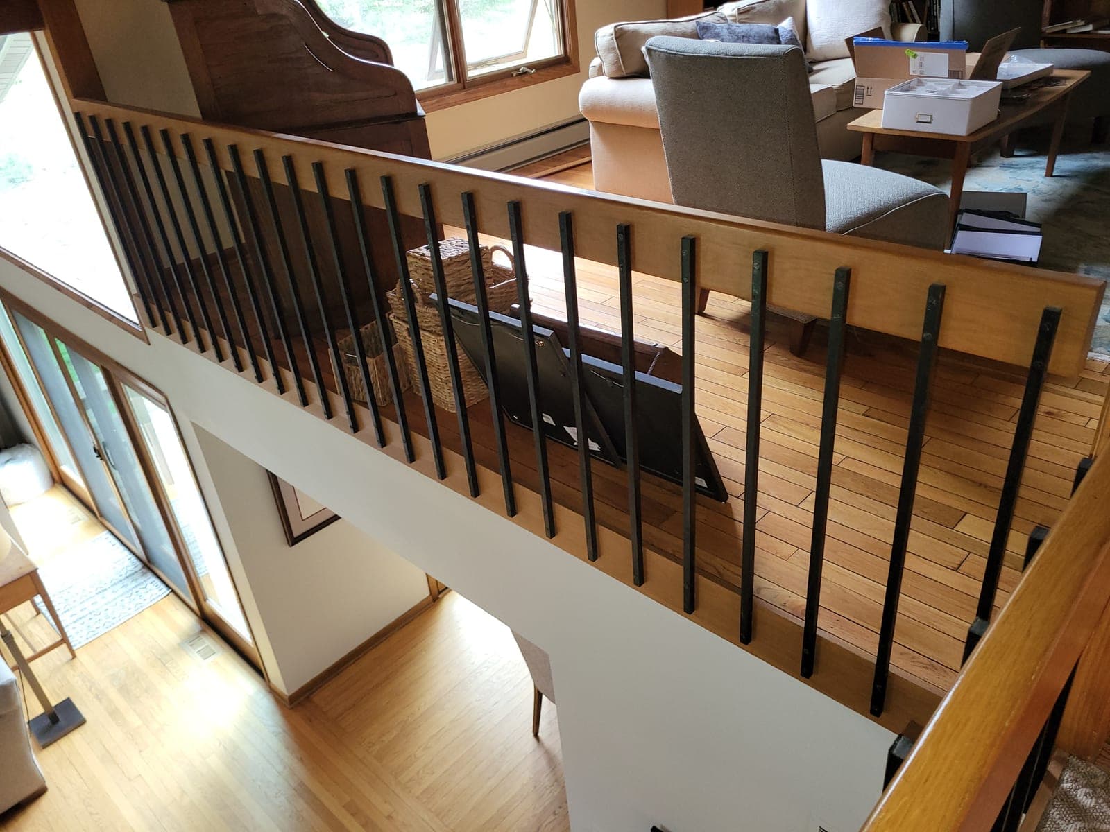 60' of Wood Handrail and toes kicks w/ wrought iron balusters